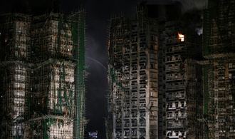 Zahl der Toten bei Großbrand in Hongkong steigt auf 94