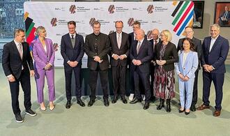 Merz unterzeichnet Vereinbarung für Olympiabewerbung