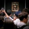Bilder nahe der Mona Lisa aufgehängt: Deutsche im Louvre festgenommen